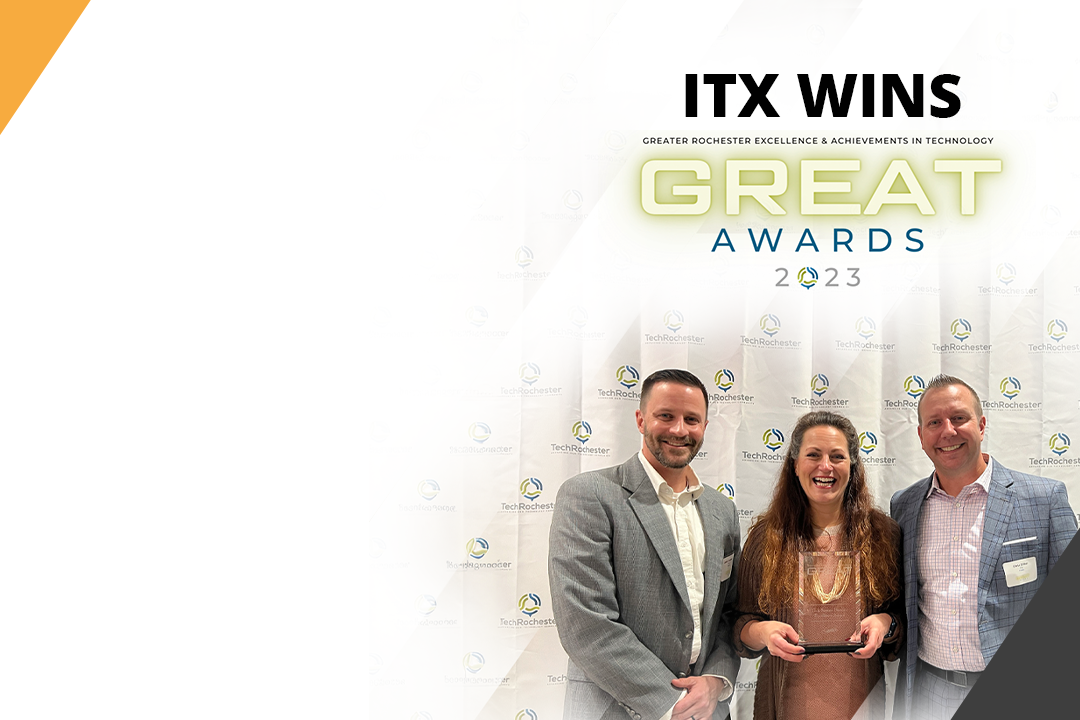 From left to right, Josh Crocker, Roberta Oare, and Chris Zirbel accepting the GREAT Award for Tech Service Provider Excellence at the GREAT Awards ceremony.